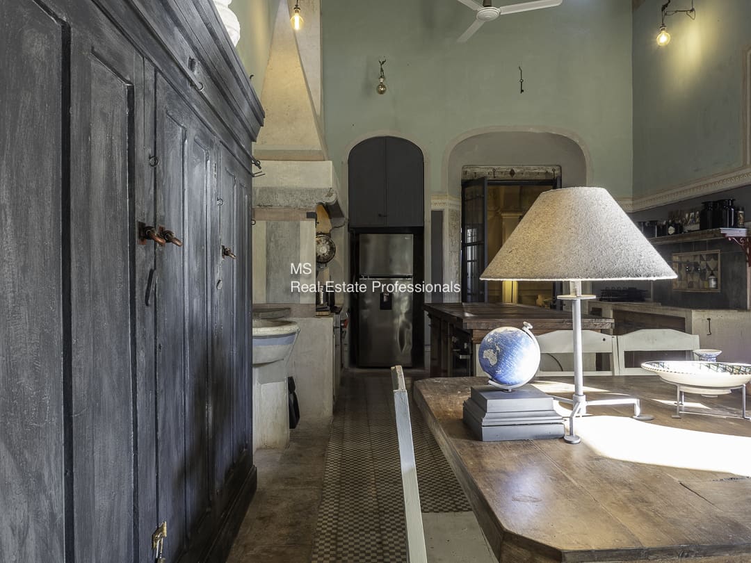A cozy interior with wooden furniture and soft lighting.