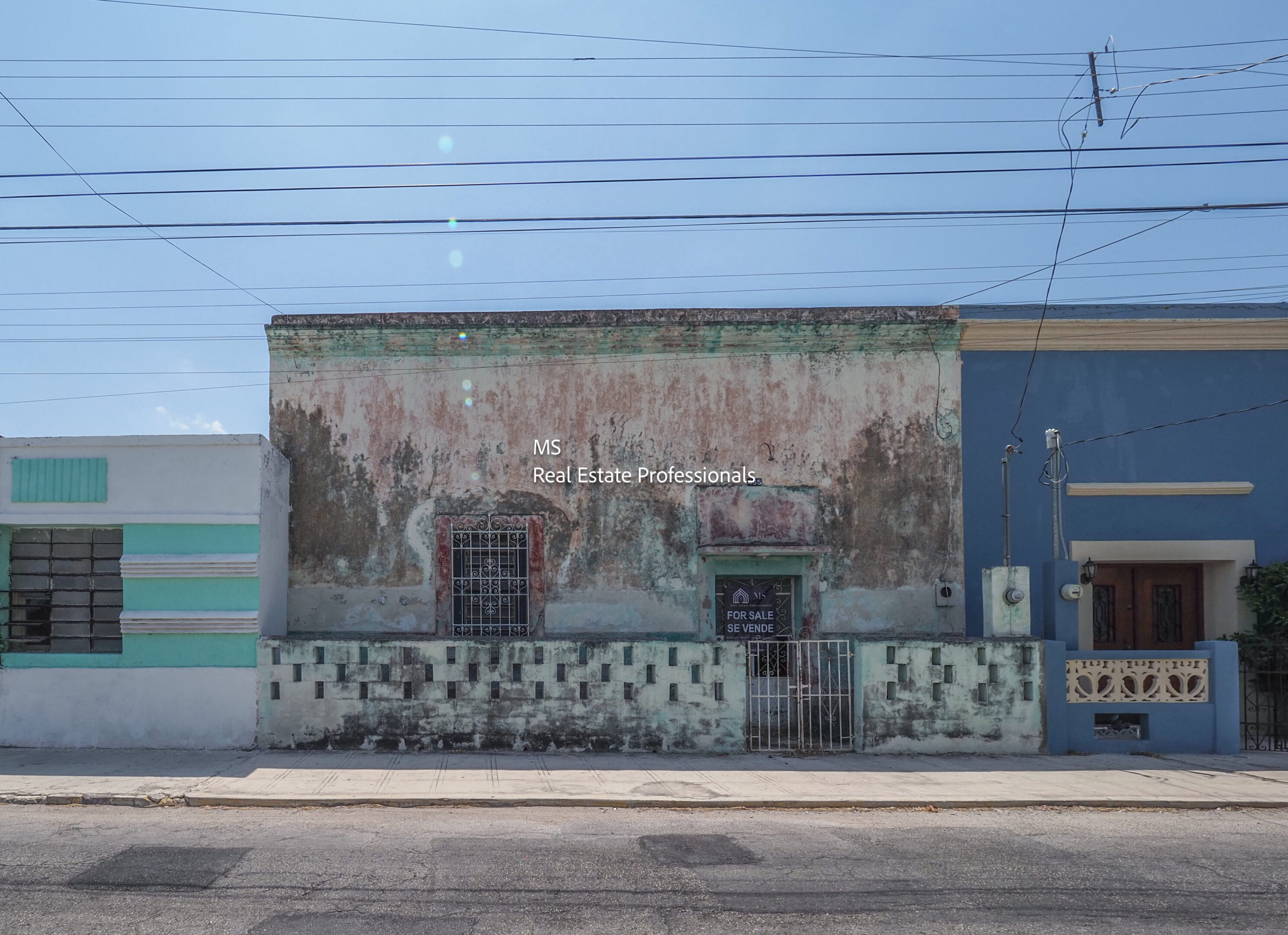 A building with graffiti on the side of it.