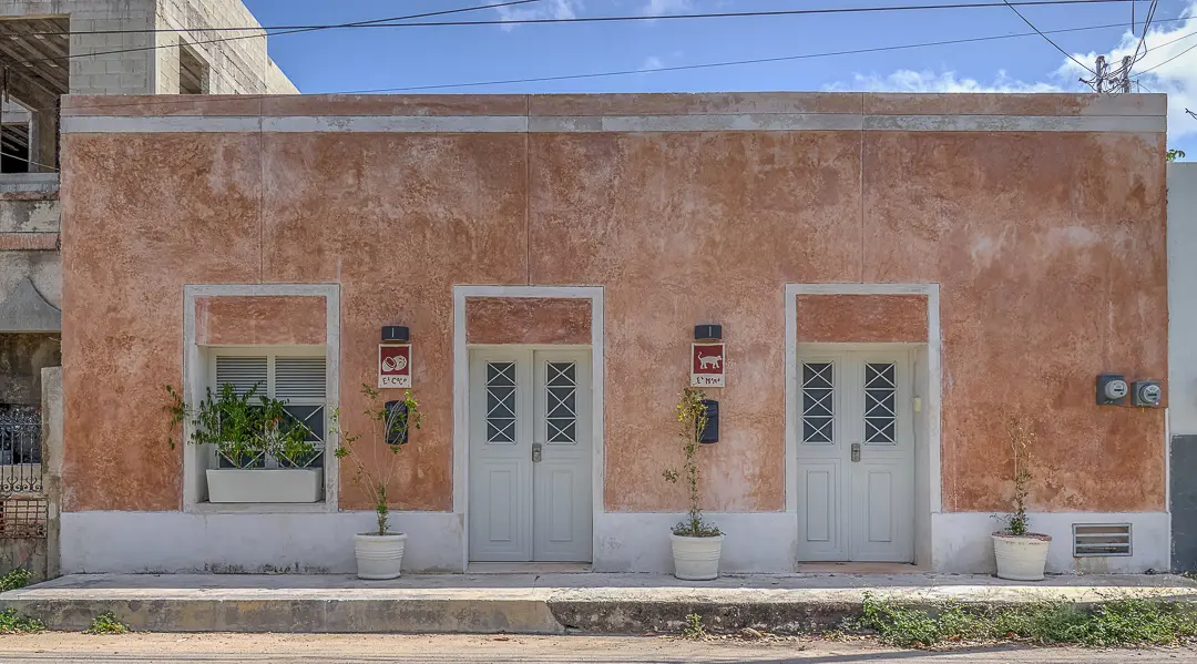 A row of doors on the side of a building.