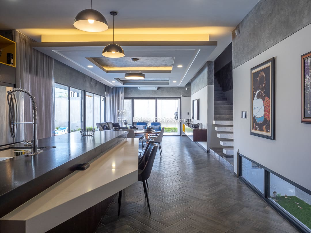 A long table in the middle of a room.