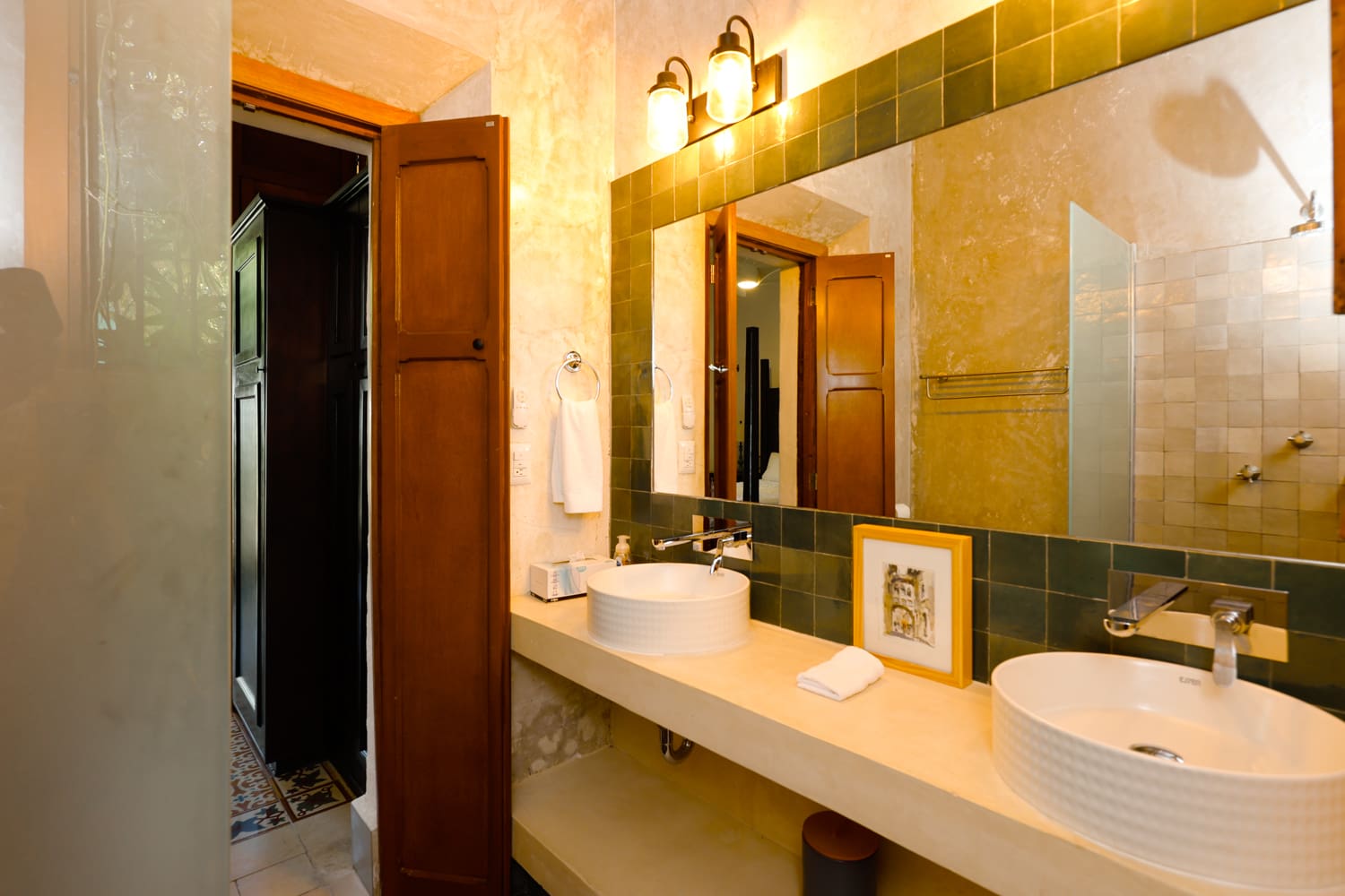 Elegant bathroom with double sinks and mirror.