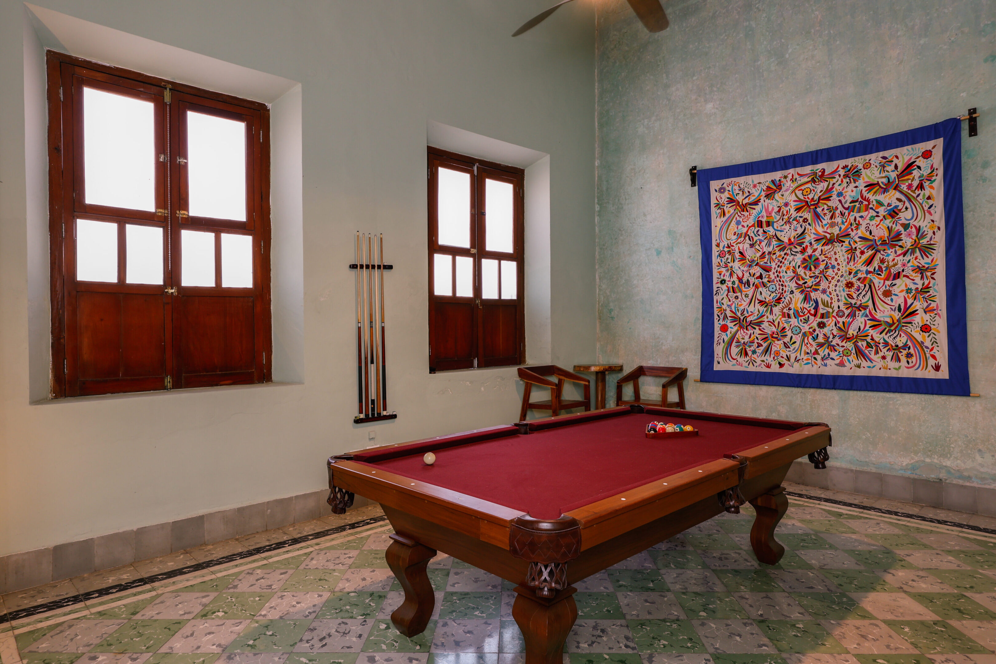 Pool table in a historic room.