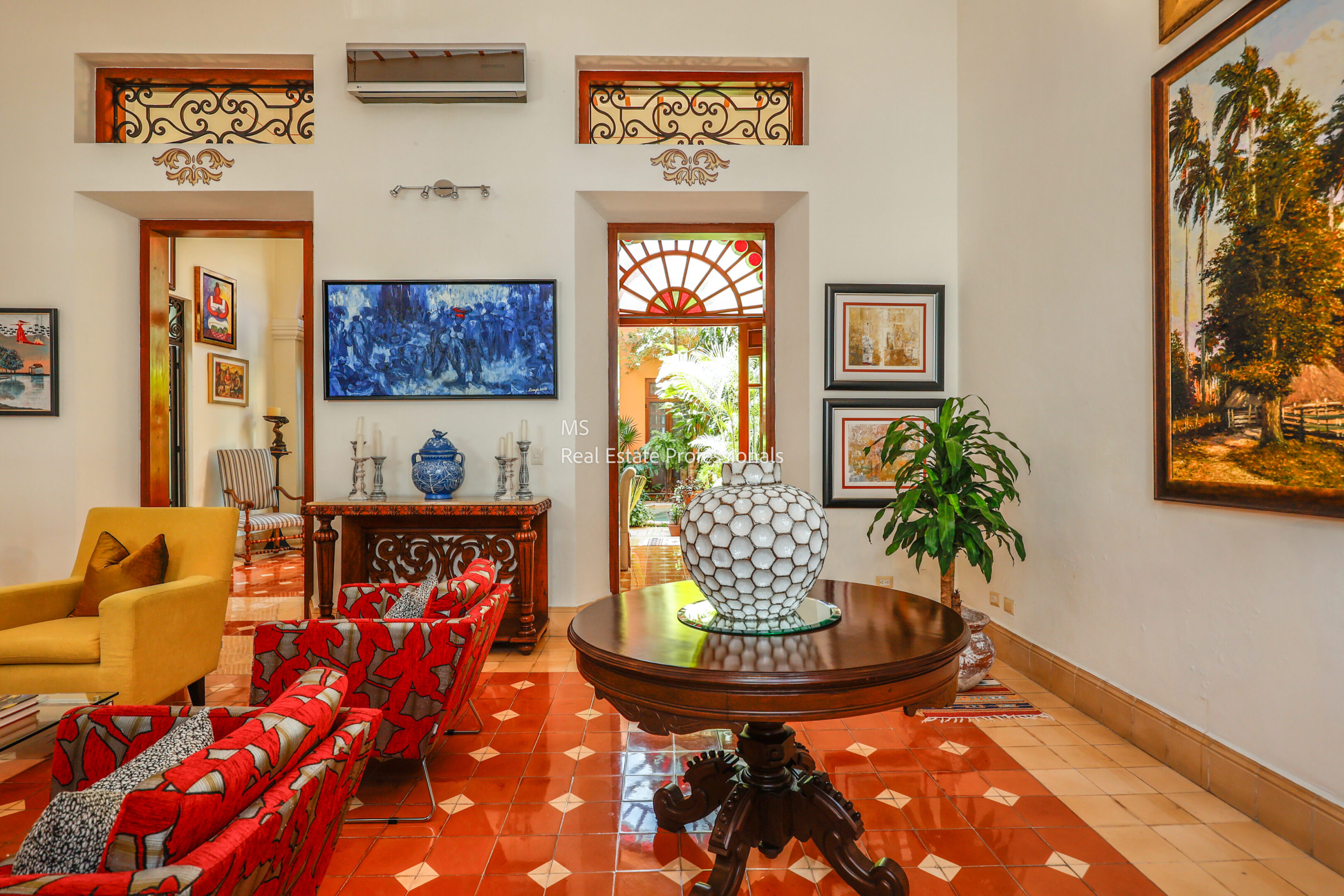 Elegant home interior with colorful furniture.