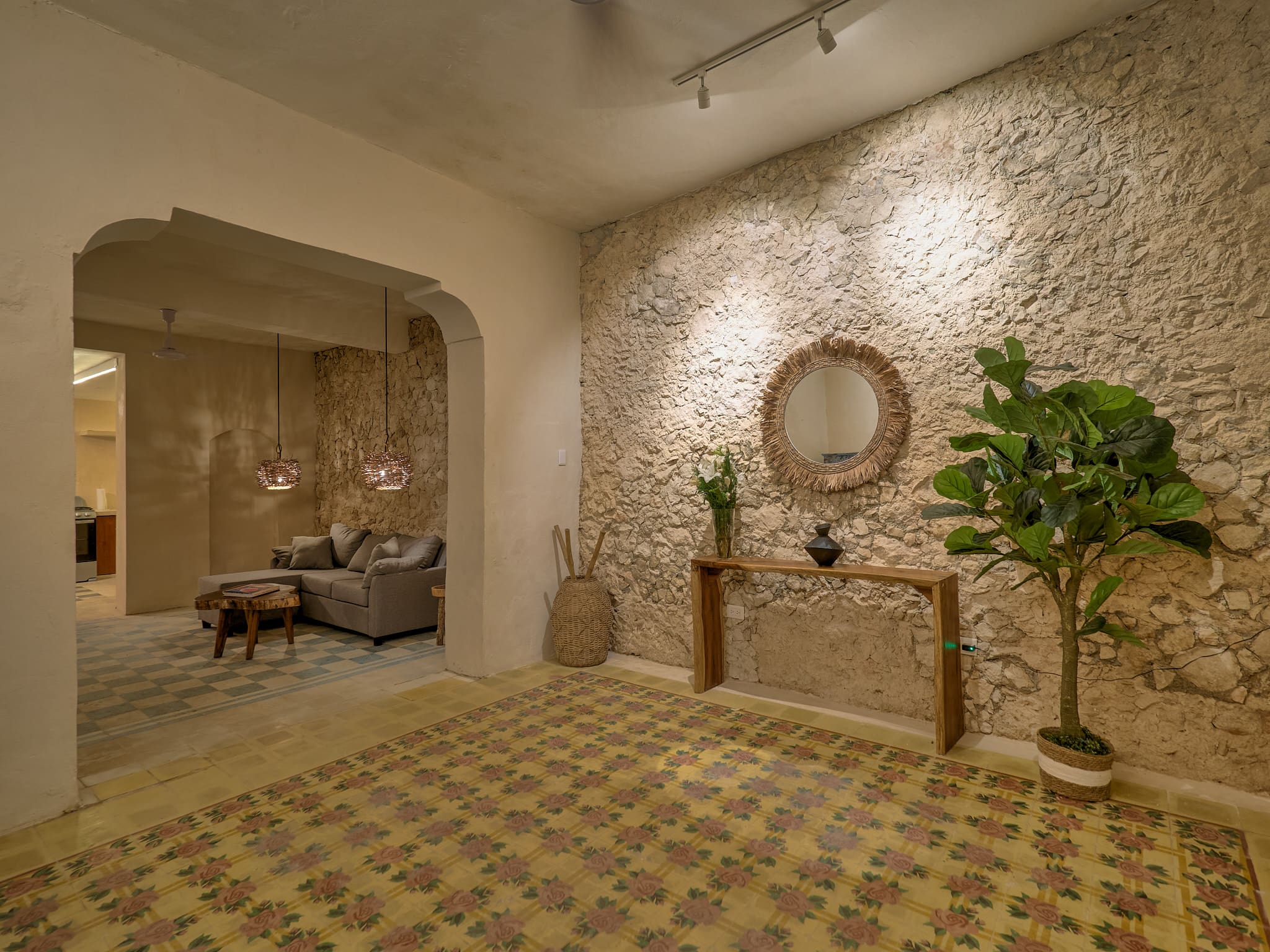 Warm rustic interior with textured walls and cozy seating area.