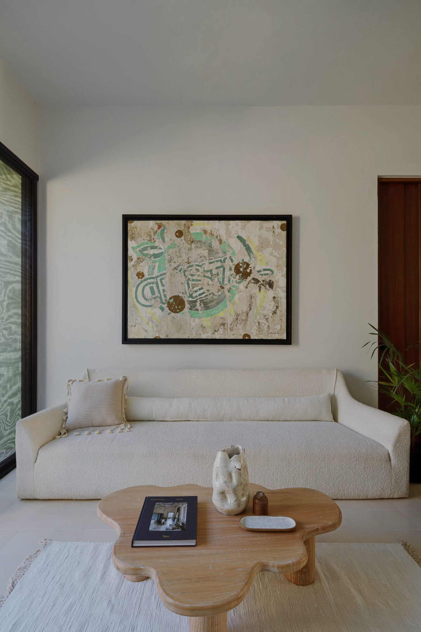 Minimal modern living room with abstract wall art