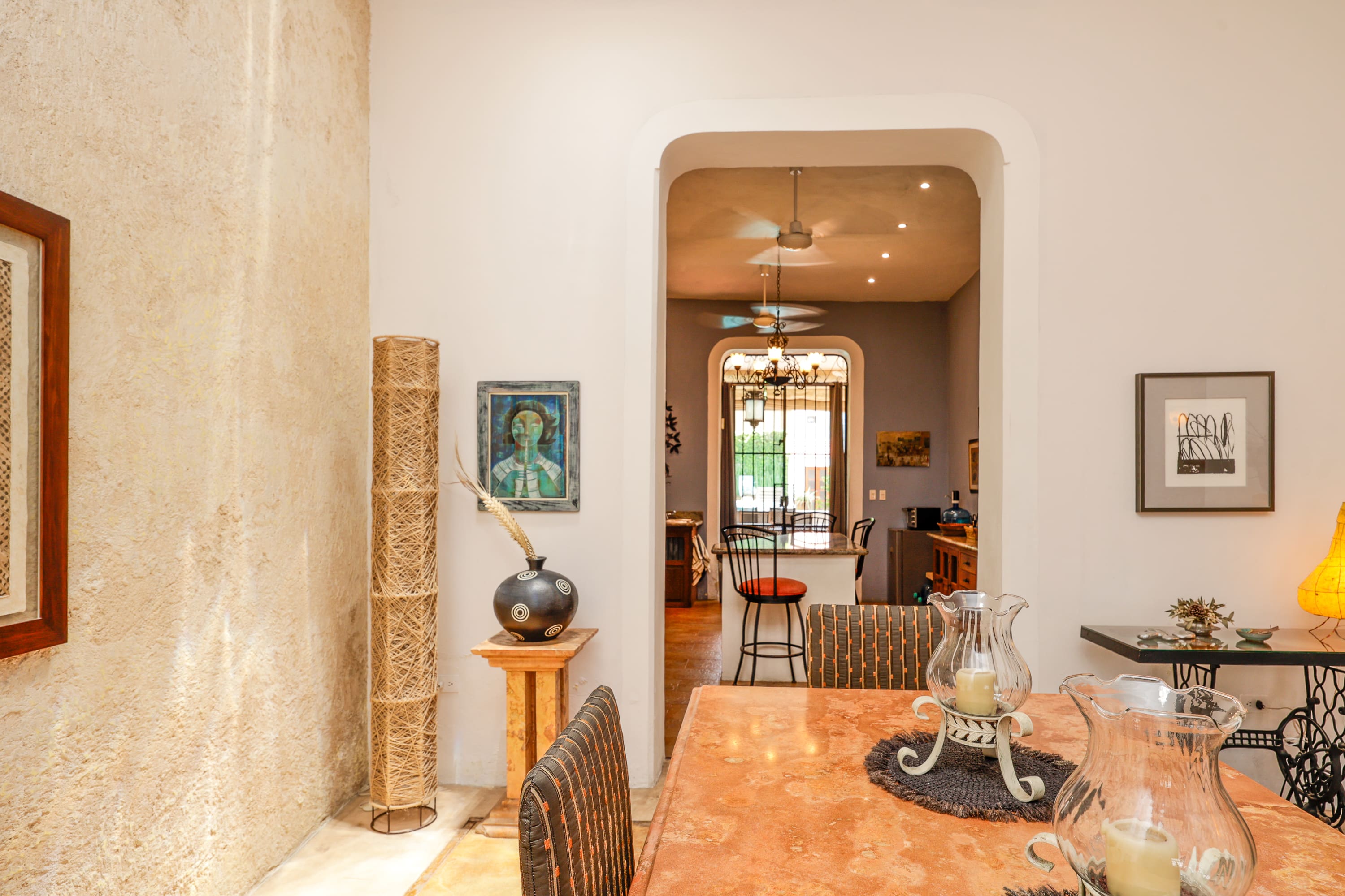 Cozy dining room with archway and decor