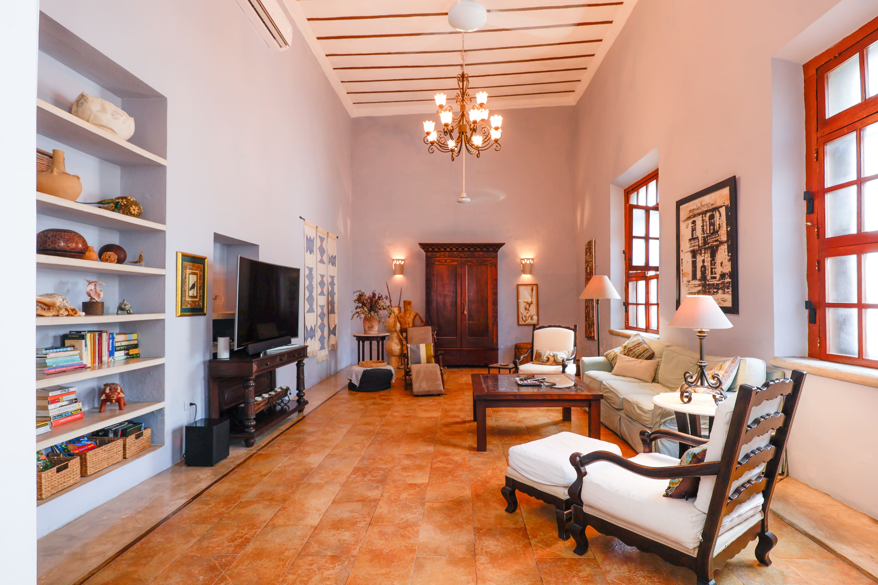 Antique-style living room with terracotta tile floor