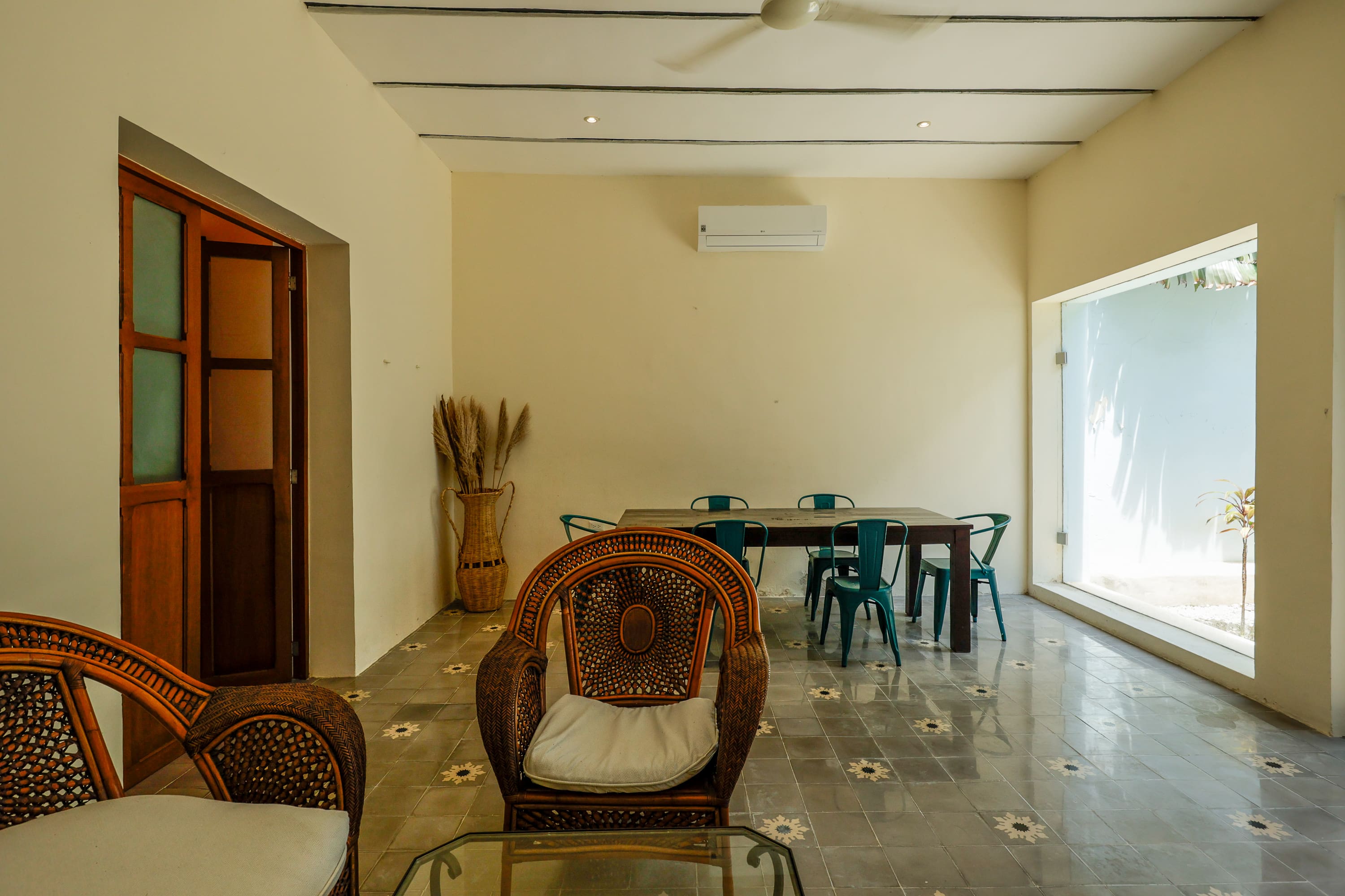 Minimalist living room with rattan chairs