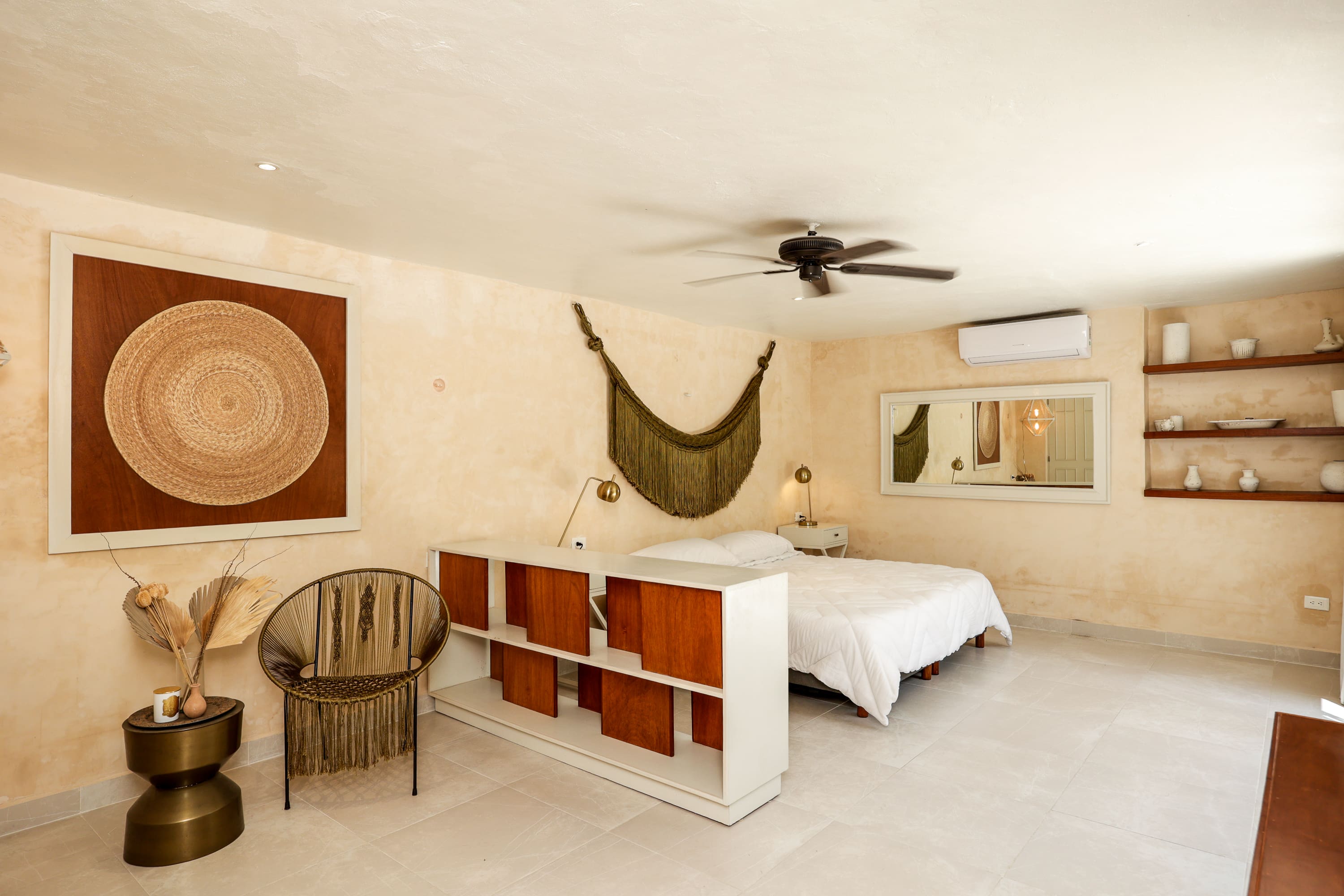 Boho-style bedroom with hammock wall hanging